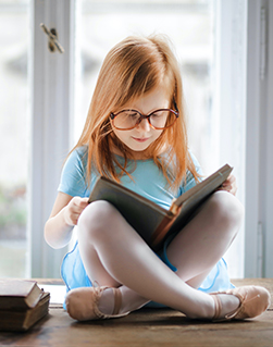 child reading a book